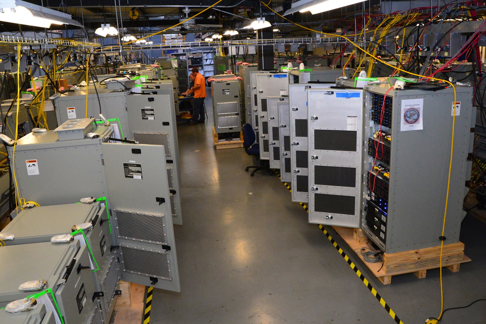 SAN DIEGO (June 18, 2014) CANES units bound for installation aboard the aircraft carrier USS Ronald Reagan (CVN 76) are loaded and tested in the SPAWAR Network Integration and Engineering Facility prior to fleet delivery. U.S. Navy photo by Rick Naystatt/SPAWAR.