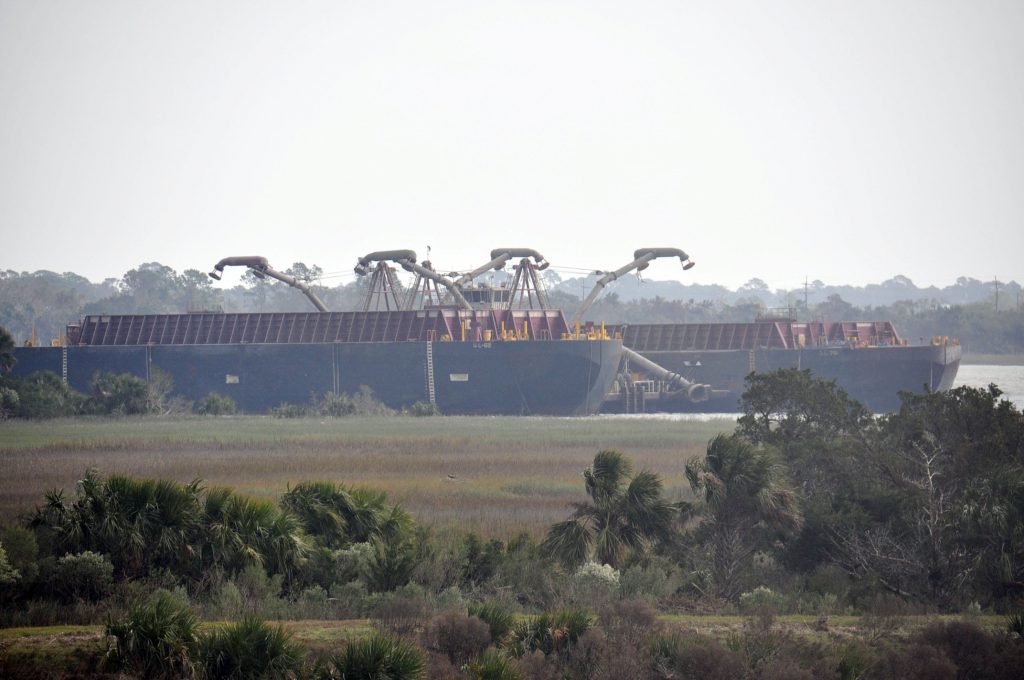 A spider barge and two scow vessels sit idle in the south channel near Fort Pulaski, Nov. 1, while the Dredge Illinois works on the other side of Cockspur Island. Photo by Russell Wicke, USACE Savannah District. 