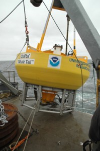 NOAA buoy "Chá bă" sits on the launch area of a vessel at sea.