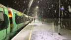 A snowy train platform