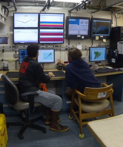 Darin Jones and Chief Scientist Patrick Ressler going over data collected.