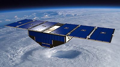 Artist's concept of one of the eight Cyclone Global Navigation Satellite System satellites deployed in space above a hurricane. Credit: NASA