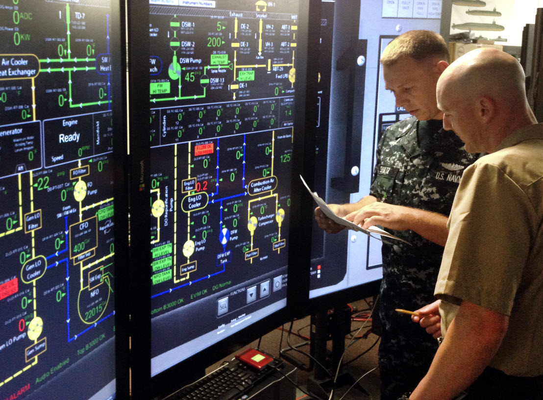 ORLANDO, Fla. (August 12, 2014) Sailors train on a new diesel generator simulator during a project review at Naval Air Warfare Center Training Systems Division in Orlando, Fla. The simulator, which uses high-fidelity 3D software, was recently installed at Pearl Harbor naval facilities by the TechSolutions office at the Office of Naval Research. U.S. Navy photo by Darrell Conley.