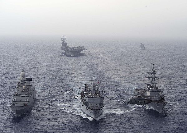 ATLANTIC OCEAN (June 16, 2016) The guided-missile destroyer USS Mason (DDG 87), right, and Italian navy destroyer ITNS Andrea Doria (D553) receive alternative fuel during a replenishment-at-sea with the Italian oiler ITNS Etna (A5326). Mason, deployed with the Eisenhower Carrier Strike Group, is conducting naval operations in the U.S. 6th Fleet area of operations in support of U.S. national security interests in Europe. U.S. Navy photo by Mass Communication Specialist 1st Class Rafael Martie.