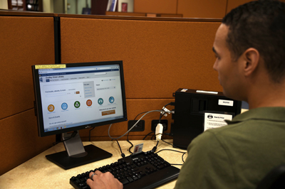 U.S. Army Capt. Leo Raabe, a student in the Naval Postgraduate School’s defense analysis program, accesses the Dudley Knox Library’s (DKL) new website, Dec. 31. DKL launched the overhauled site to provide its student, faculty users with improved access to its many resources. Photo courtesy of NPS.