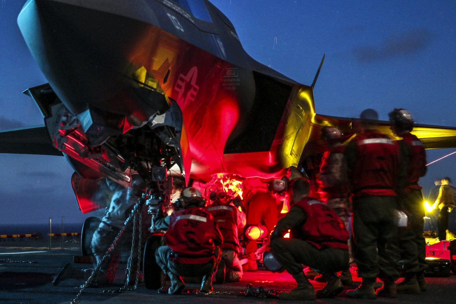 Marines load ordnance onto an F-35B Lightning II during operational testing aboard the USS Wasp at sea, May 27, 2015. Marines and sailors have been working together since May 18 to assess the integration of the F-35B Lightning II, which is on track to replace the F/A-18 Hornet, AV-8B Prowler and AV-8B Harrier. U.S. Marine Corps photo by Cpl. Anne K. Henry 

