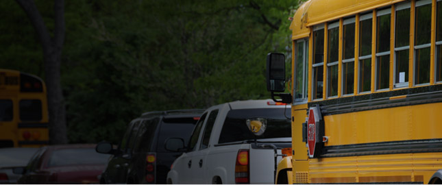 Picture of a school bus waiting in traffic