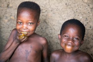 Children from over 4,000 vulnerable families could eat three healthy meals a day after their parents used cash transfers from Catholic Relief Services to invest in their farms and buy food. / Michael Stulman, CRS