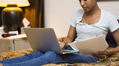 Woman seeing if she qualifies for savings