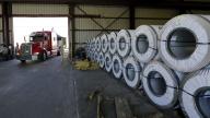 A truck pulls into the warehouse of an international engineering systems company in Texas.