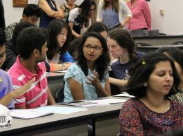 Students talking among themselves in classroom (Courtesy of Nikita Ankem)