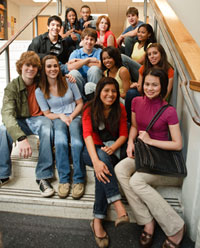 	Teenagers sitting on school steps
