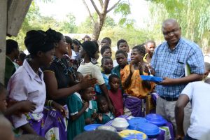 Emmanuel Ngulube visits programs in the field. /USAID