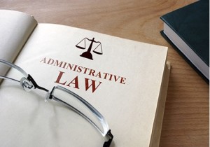 a picture of glasses on an administrative law legal book