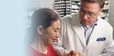 photo of pharmacist talking to woman