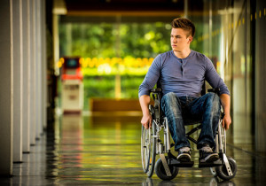 photograph of a man in a wheelchair