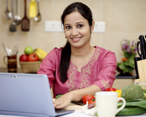 A woman uses a computer