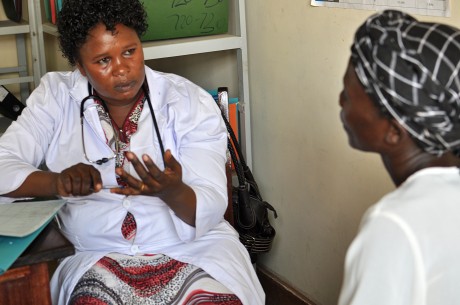 Agnes provides integrated HIV and family planning counseling to client. Photo credit: Carol Bales, IntraHealth International.