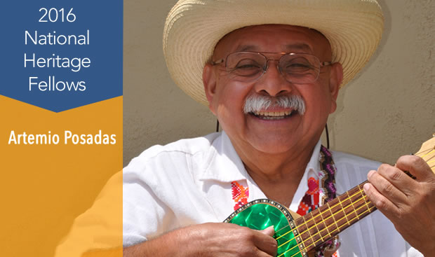 Artemio Posadas -- 2016 NEA National Heritage Fellows -- A man in a straw hat plays a small string instrument.