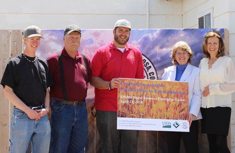 Photo of State Director Kareus at Colorado Malting Company in Alamosa