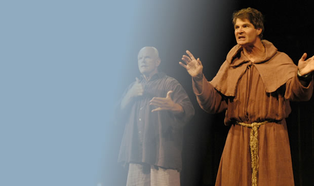 Actor on stage dressed as a monk.