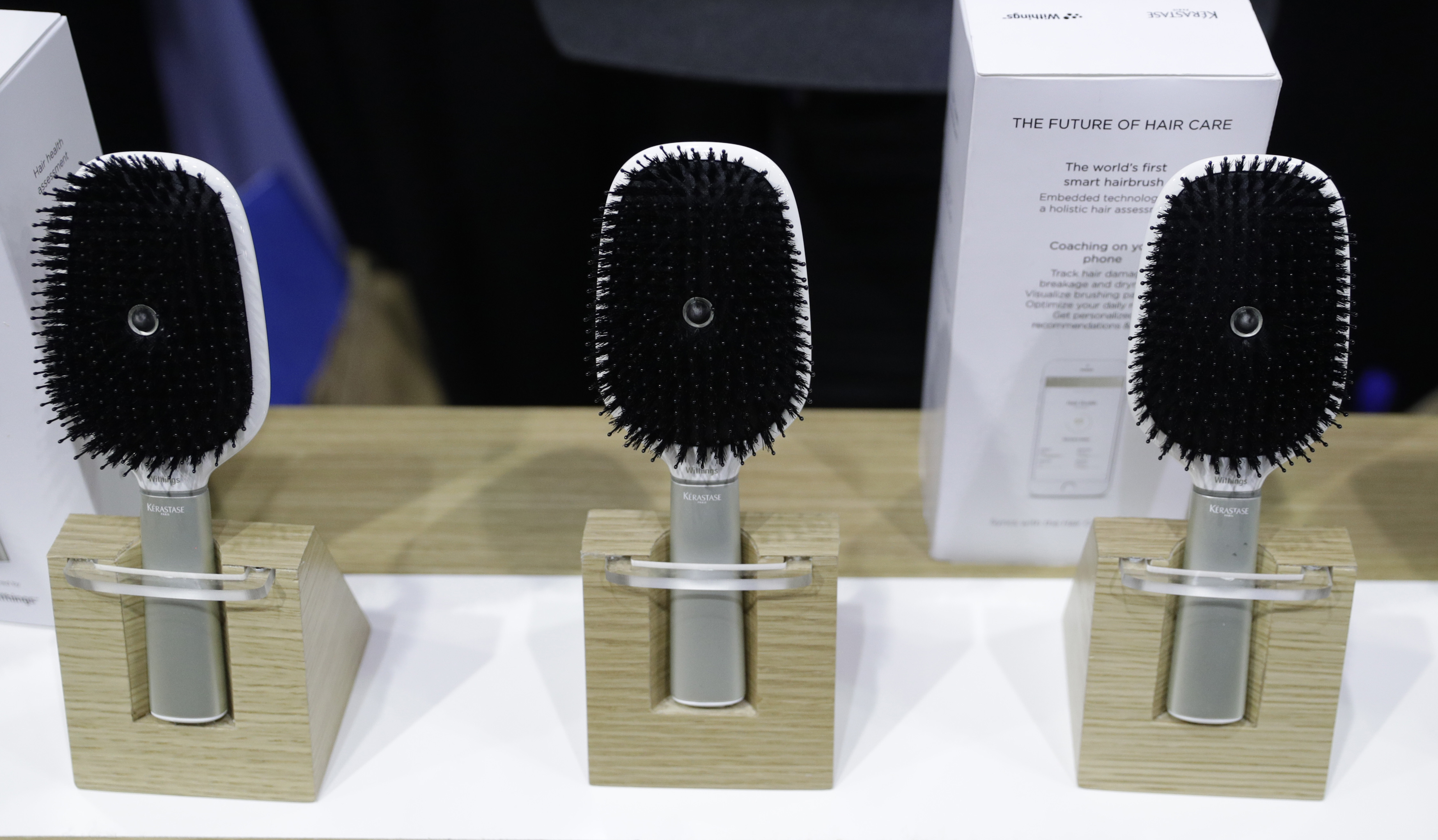 Three hairbrushes on display (© AP Images)