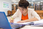 Young girl writing