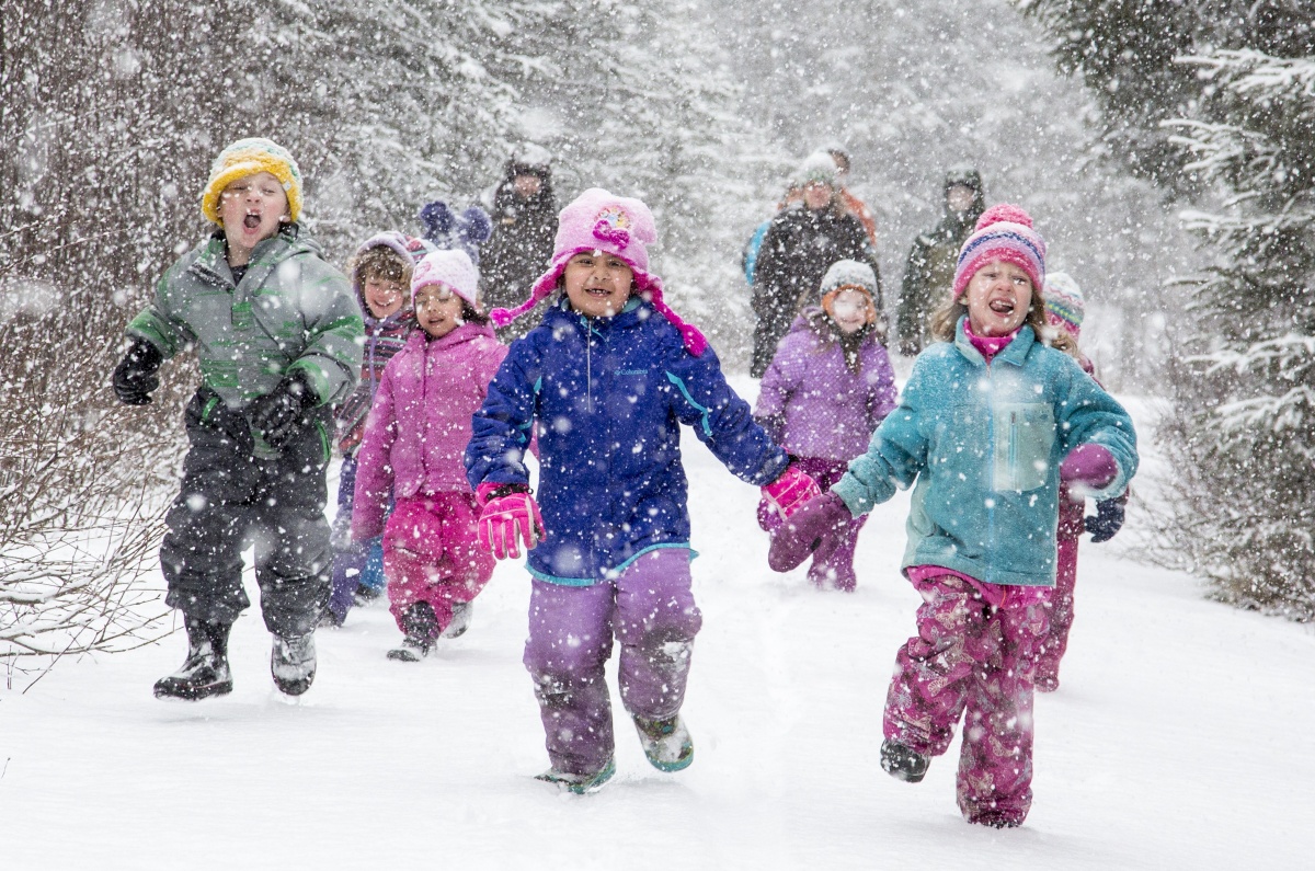 Students run in the snow at Campbell Creek Science Center in Alaska. Photo by Bob Wick, BLM.