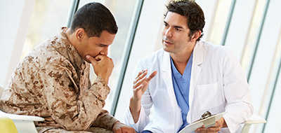 Consulter talking with a Veteran