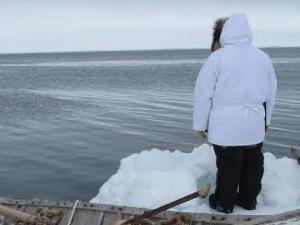 Subsistence hunter watching for whales