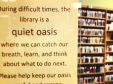Sign stating &quot;During difficult times, the library is a quiet oasis...&quot;