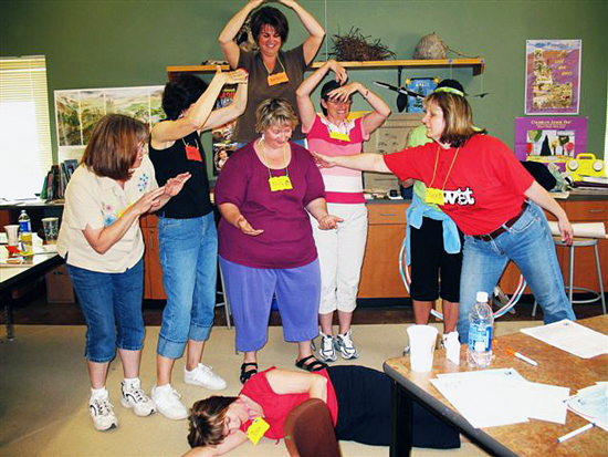 Teachers participating in class exercise