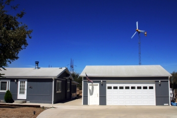 A small wind turbine can produce enough energy to cover the electricity costs of the average American home. | Photo from Bergey Windpower Co., Inc.; NREL 13830