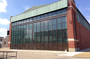 A historic hangar at the Wright-Patterson Air Force Base in Ohio was salvaged and restored with window films to reduce solar heat gain, occupancy sensors to control interior lighting, and daylight sensors to maximize energy savings and enhance productivity.