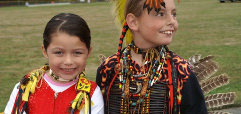 Young girl and boy in native dress 