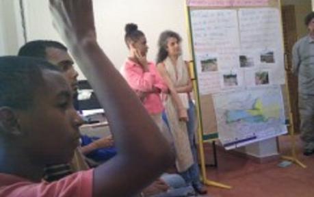 High schoolers in Samaná, Dominican Republic learn about climate change so they can help educate others in their community, in a