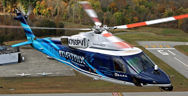 DARPA’s Aircrew Labor In-Cockpit Automation System (ALIAS) program demonstrates its developmental technology system on a Cessna 208 Caravan fixed-wing aircraft (top) and a Sikorsky S-76 helicopter (bottom) during Phase 2 flight tests. ALIAS envisions a tailorable, drop-in, removable kit that would provide high levels of automation in existing aircraft and facilitate reduced need for onboard crew. Photo courtesy of DARPA.