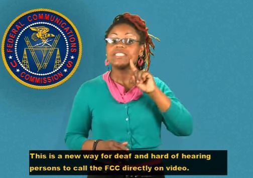 An African-American female using American Sign Language to describe the FCC's Direct Video Calling program for individuals using American Sign Language