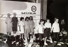 Vintage black and white photo of group of young school children (© STR/AFP/Getty Images)