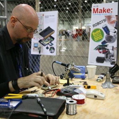 Gareth Branwyn turning computer mice into light-seeking robots at the 2007 Maker Faire Bay Area. Read more at arts.gov! Photo by Scott Beale #TBT #NEAarts