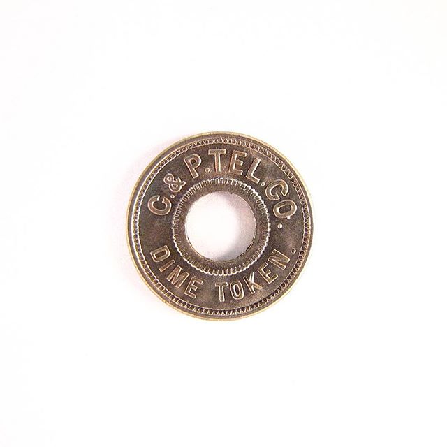 #FBF Telephone tokens were once common in both the United States and other parts of the world and were used to make calls at public #phones. The Scovill Manufacturing Company produced this telephone token during the early 20th century. The Scovill Company was an early industrial American innovator, adapting armory manufacturing processes to mass-produce a variety of consumer goods including: medals, coins and transportation tokens. #FCCGov #Telecom #History (Photo credit: @smithsonian @amhistorymuseum)
