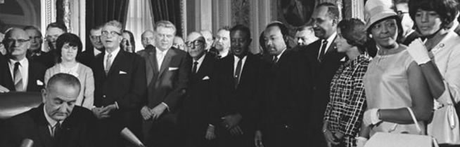 President Lyndon Johnson signs the Voting Rights Act