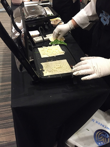 Gwinnett County Public Schools culinary students preparing chicken pesto panini