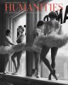 Ballerinas standing in window alcove of ballet school