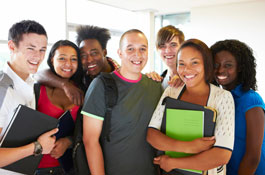 	group of diverse teens in hall