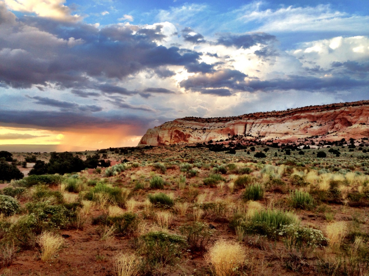 scenic view of grand staircase escalante with clouds over landscape