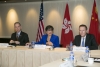 Consul General Hart (left), Secretary Pritzker (center), and General Counsel Welsh (right) meet with business leaders in Hong Kong