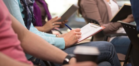 Students taking notes during lecture