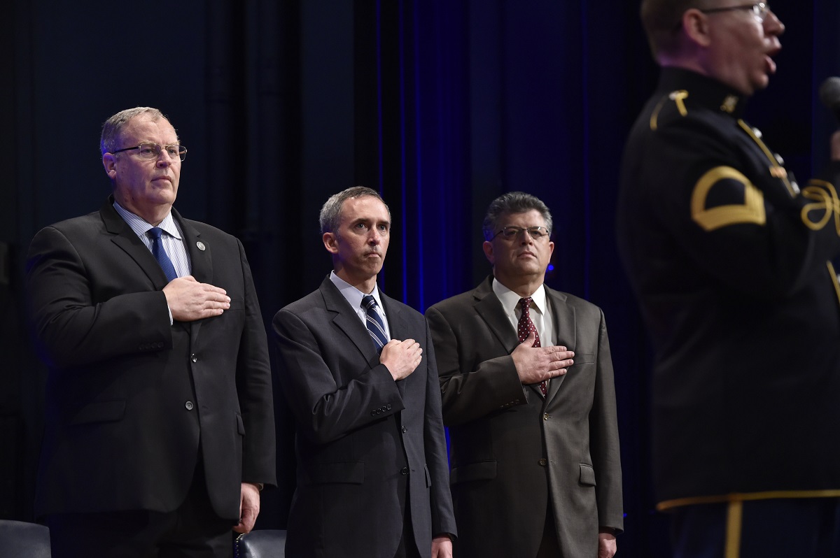 (Left to right) Deputy Defense Secretary Bob Work, Undersecretary of Defense for Intelligence Marcel Lettre and Director of Administration and Management Michael L. Rhodes render honors as an Army vocalist sings the national anthem during the 4th Estate Presidential Rank Awards ceremony at the Pentagon, June 21, 2016. Lettre spoke at the Atlantic Council in Washington, Sept. 13, 2016, discussing the need for transparency in the intelligence community. DoD photo by Air Force Senior Master Sgt. Adrian Cadiz 