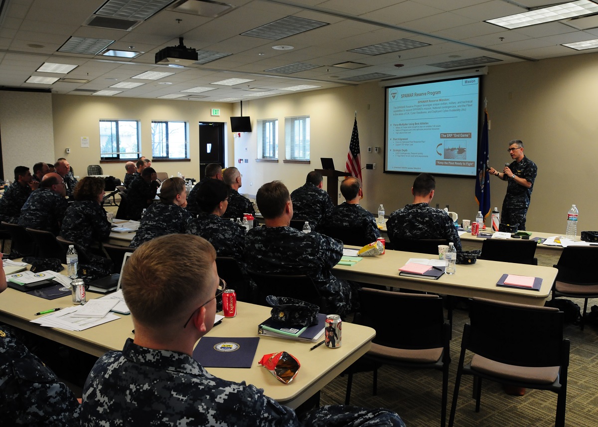 AURORA, Colo. (May 16, 2015) Rear Adm. Daniel J. MacDonnell, Commander, Information Dominance Corps Reserve Command (IDCRC) and Reserve Deputy Commander, Navy Information Dominance Forces, speaks to members of the Information Dominance Corps Reserve Command at the 2015 IDCRC Leadership Summit at Buckley Air Force Base in Aurora, Colo.  The leadership summit brings together the many leaders in the ID community with different briefs and small-group breakout session. U.S. Navy Photo by Mass Communication Specialist 1st Class John Lamb.